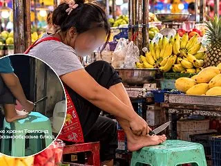タイの屋台で店員が包丁で足の爪の手入れを…